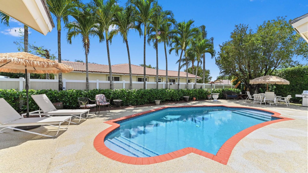 Margate House | Tropical Oasis Escape with Heated Pool & BBQ