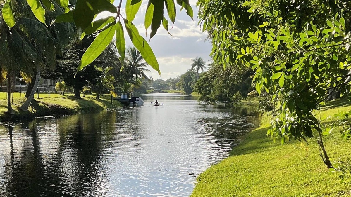 Wellington House | Tropical Oasis Pool home, close to WEF, Airport, and Beaches