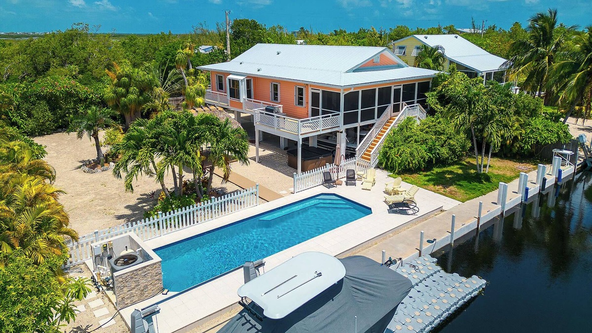 Big Pine Key House | Tropical Oasis with Beautiful Home, Pool, Dock and Tiki Hut