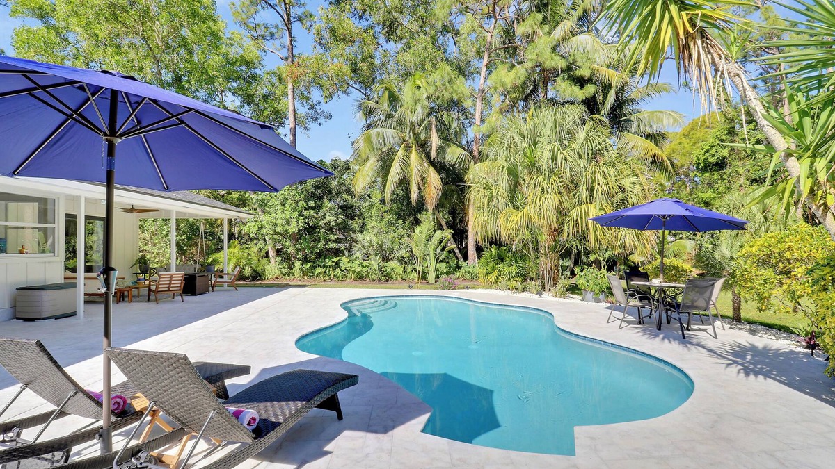 Jupiter Farms House | Tropical Paradise in Jupiter Farms with Heated Pool and bocce court, sleeps 7