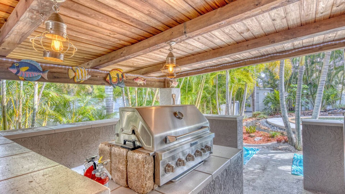 Whitney Beach House | Tropical Retreat Near AMI & IMG | Outdoor Kitchen
