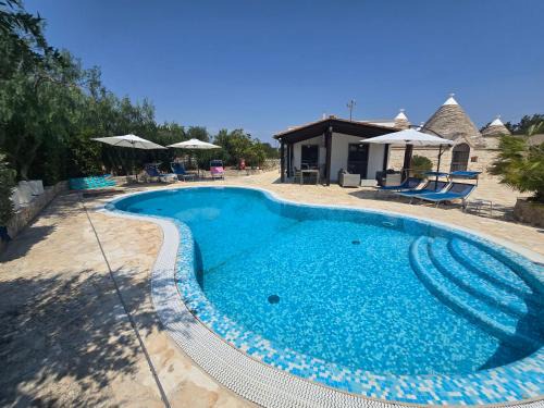 Martina Franca House | Trullo Olivia con piscina riscaldata, natura e relax