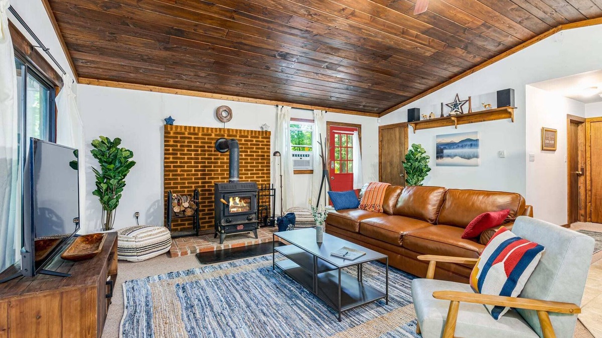 Great Cacapon Cabin | Tucked Away w/Hot Tub, Fire Pit, Deck & WiFi
