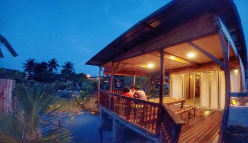 Ipoh House | Tung's Tropika - With a Wooden Hut by a Lake