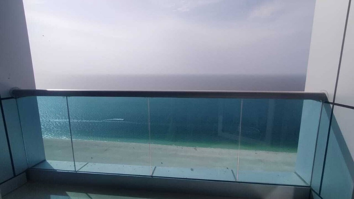 Rumailah Apartment | Two-bedroom hotel apartment with a living room and a sea view, VIP