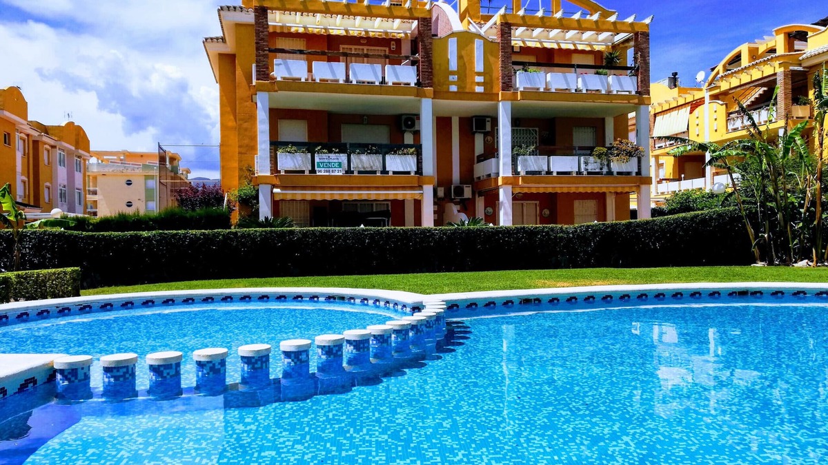 Xeraco Beach Apartment | Two bedrooms on the ground floor, patio with barbecue, swimming pool and tennis court.