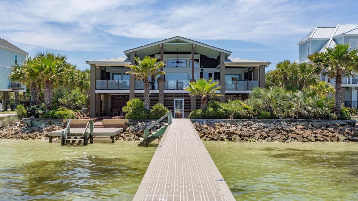 Villa Primera House | Two kitchens, 2 living areas, 5 beds, 4 baths & game room! Soundfront pool
