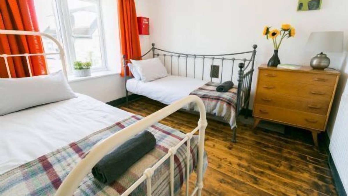 Moelfre Apartment | Ty Cefn - a cosy fire that sleeps 5 guests in 3 bedrooms