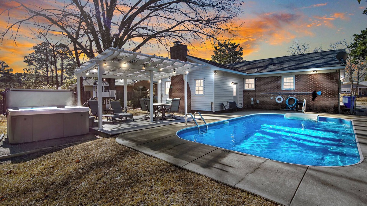 Terry Sanford House | Ultimate Family Getaway: Private Pool & Hot Tub, Game Rooms & Playground