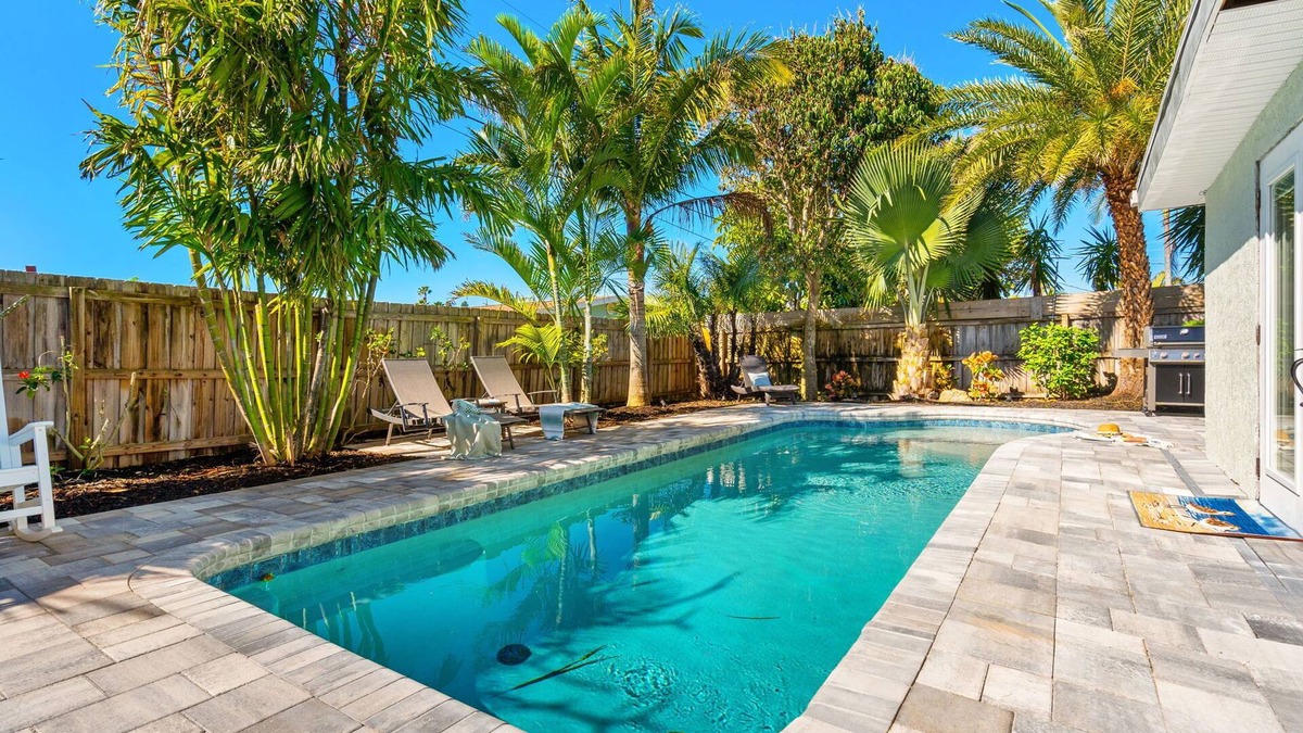 Seacoast Shores House | Ultimate Beach Oasis: Heated Pool, Game Room, BBQ & Pet-Friendly 🏖️