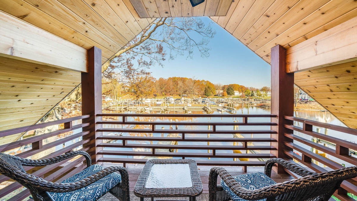 South Haven Cottage | Unwind in Riverfront Comfort — Hot Tub, Fire Pit, Boat Slip, Kayaks