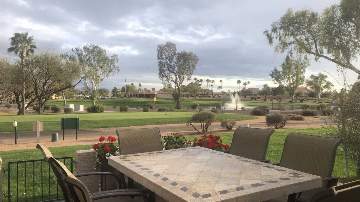 Cottonwood House | Updated 2BR end unit townhome, 10th tee box with water view and wrap around deck