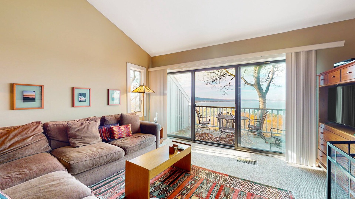 Maple City Condo | Updated condo in Glen Arbor with Lake Michigan views, fireplace, deck, W/D