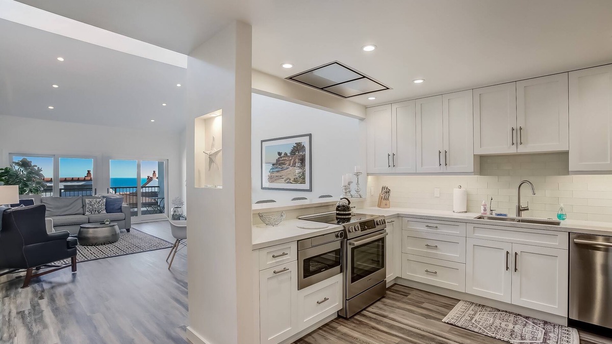 East Mesa Condo | Updated Penthouse! Steps from the sand at Leadbetter Beach, pool, spa, BBQ and more!