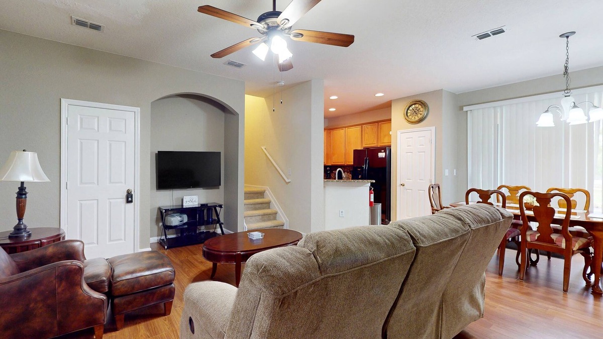 Trafalgar Village House | Updated retreat with pool access, W/D, AC, & patio - close to Disney Parks