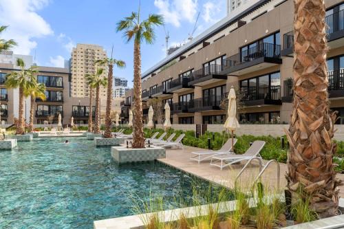 Jumeirah Village Circle Apartment | Urban Studio With Pool & Tennis Court