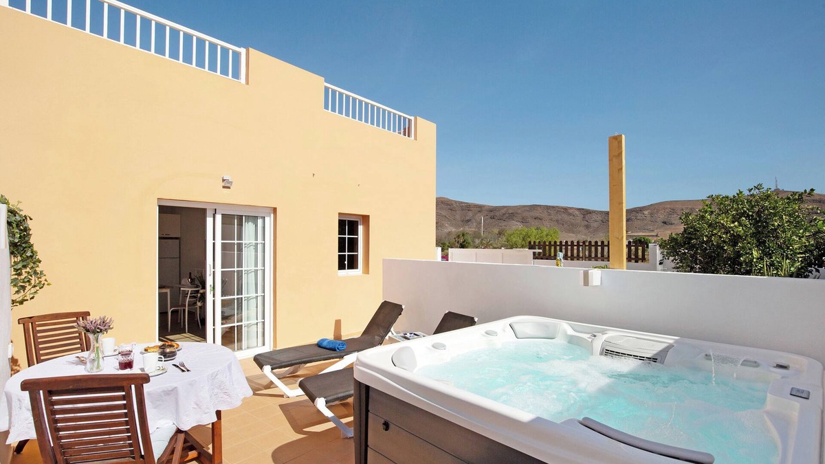 Tarajalejo Apartment | Vacation Apartment 'El Naranjo Con Jacuzzi' with Private Terrace, Private Garden and Wi-Fi