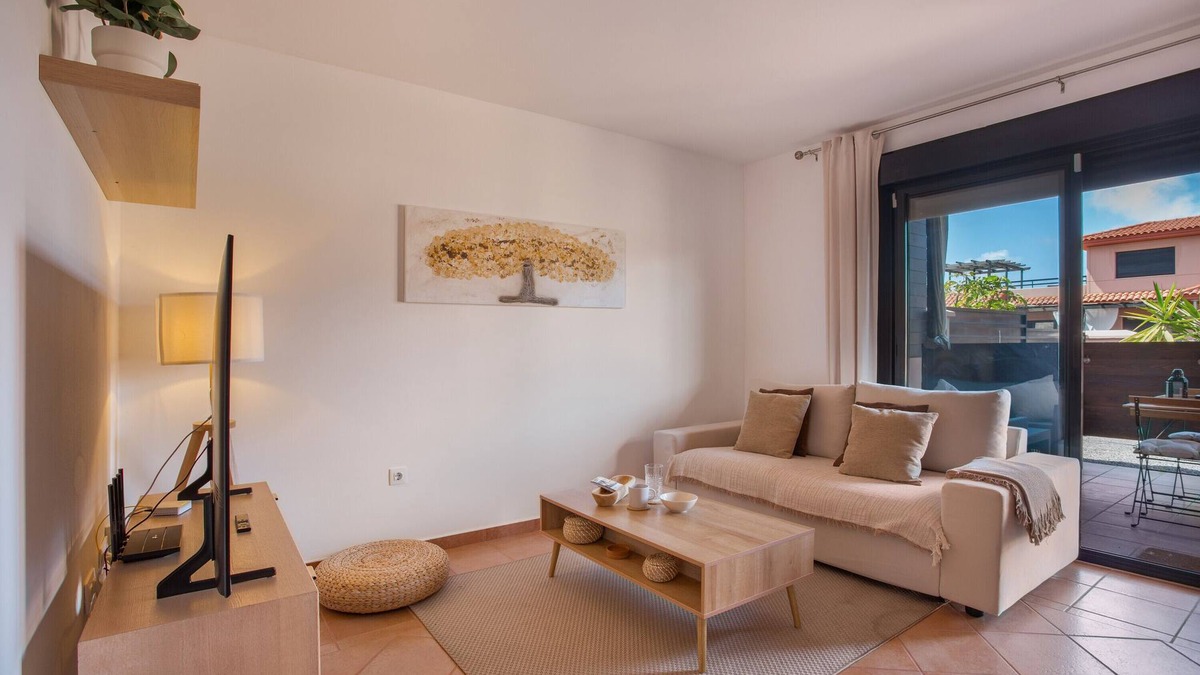 La Oliva Apartment | Vacation 'Casa Del Amanecer' with Sea View, Shared Pool and Wi-Fi