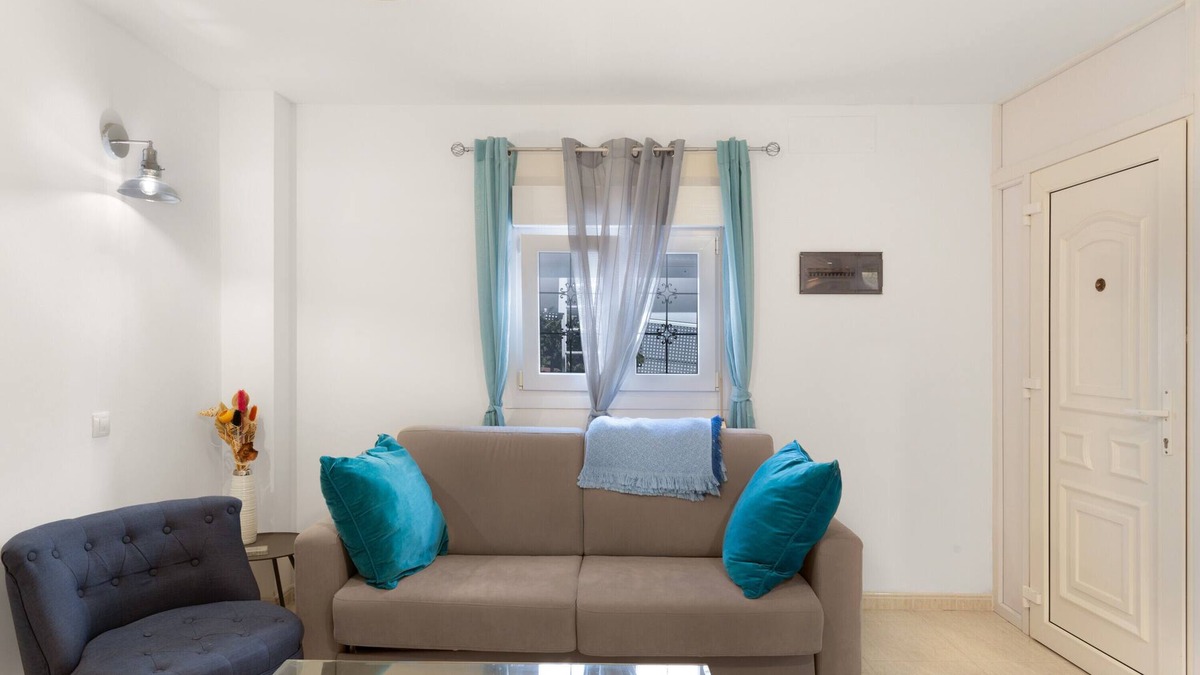 Playa de Arinaga Apartment | Vacation 'Casa Paula - 25' with Mountain View, Shared Pool and Wi-Fi