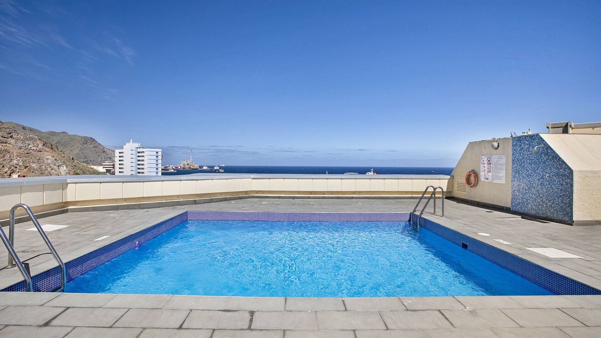 Santa Cruz de Tenerife Apartment | Vacation Apartment 'Sovhispan' with Sea View, Shared Pool and Wi-Fi