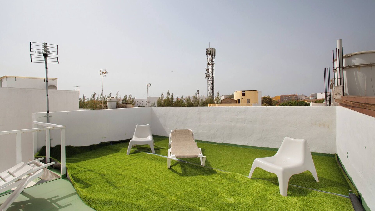 Santa Lucia House | Vacation Home 'Atico Vecindario, Aeropuerto' with Private Terrace, Balcony and Wi-Fi