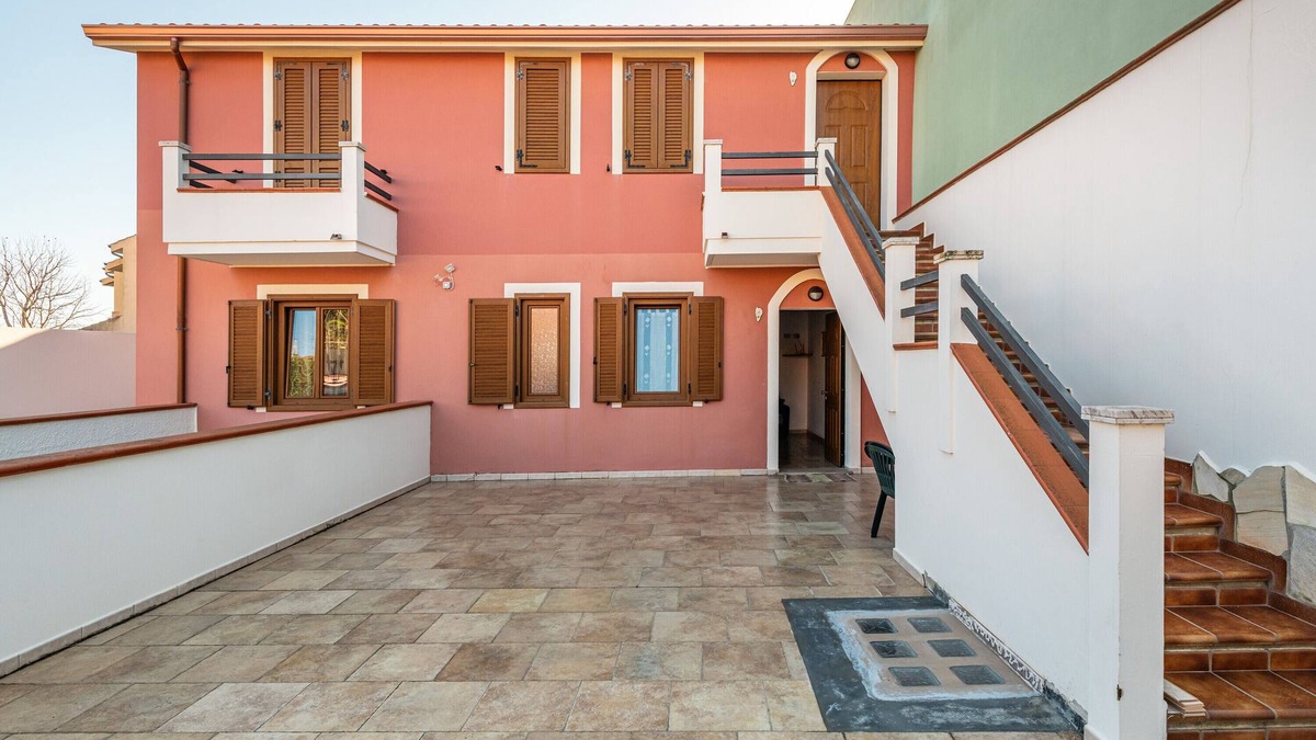 Sant'Antioco House | Vacation Home "Casa Vacanza L'Agave A" with Shared Terrace, A/C & Wi-Fi