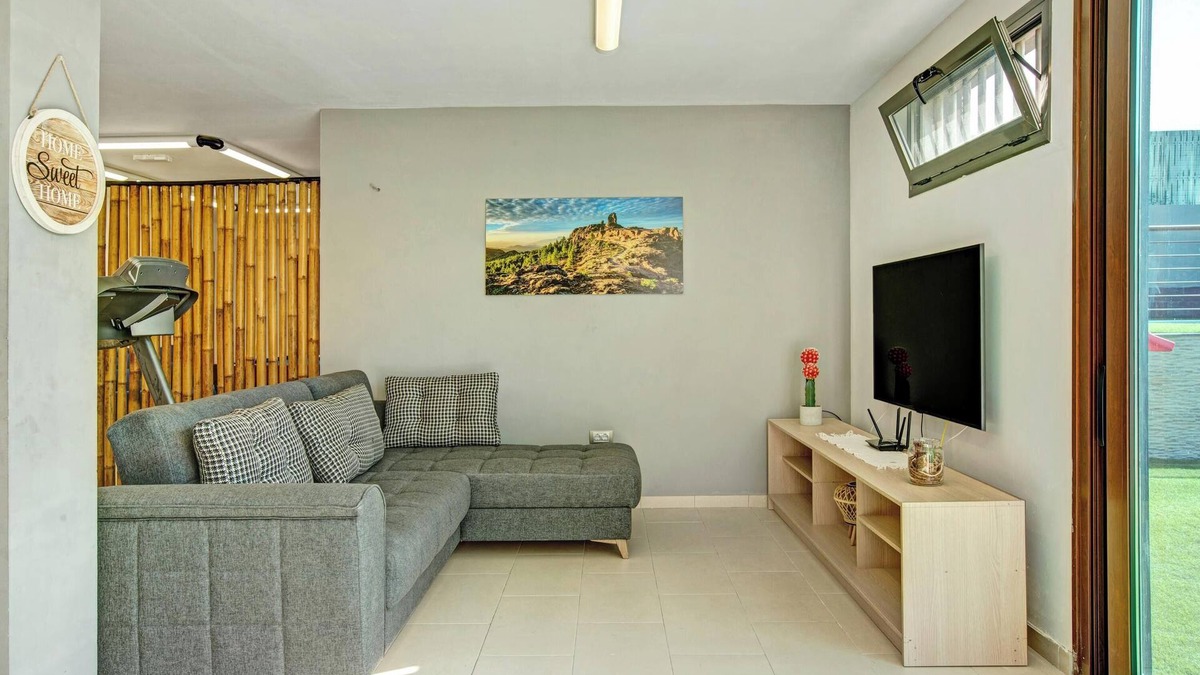 Las Palmas de Gran Canaria Apartment | Vacation Home "Harmony Level Floor" with Shared Pool, Garden & Wi-Fi