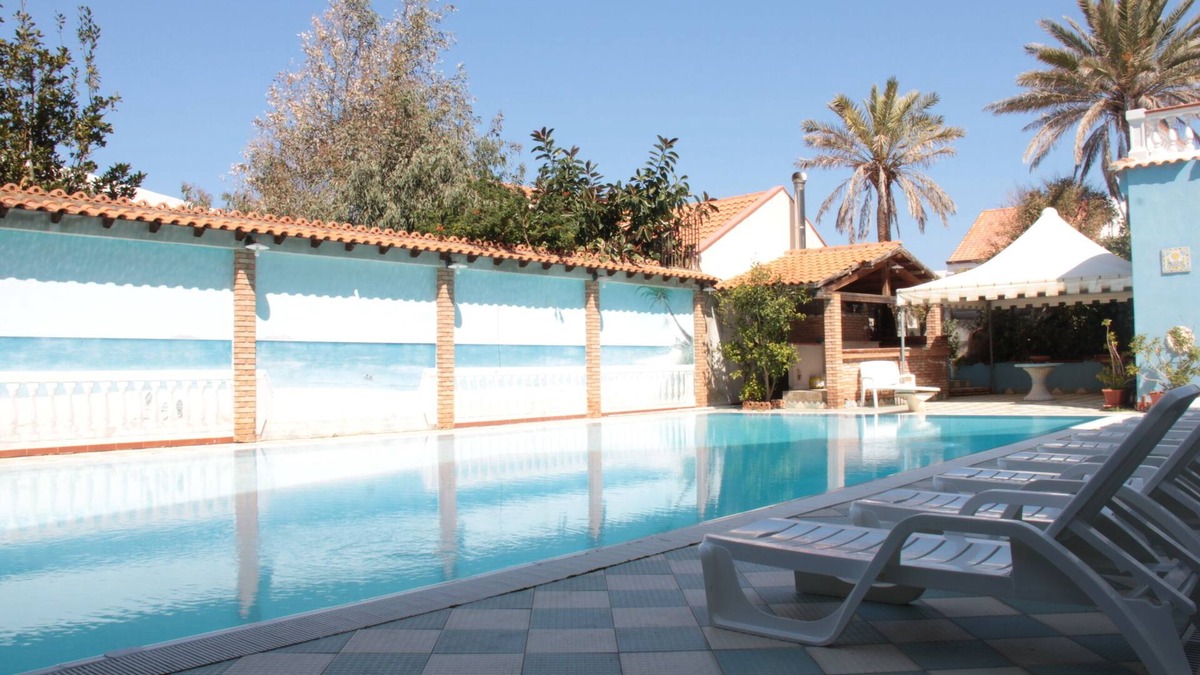 Province of Messina House | Vacation Home "Oasi Azzurra - Bilocale Plus 2" with Sea View, Shared Pool & Shared Terraces