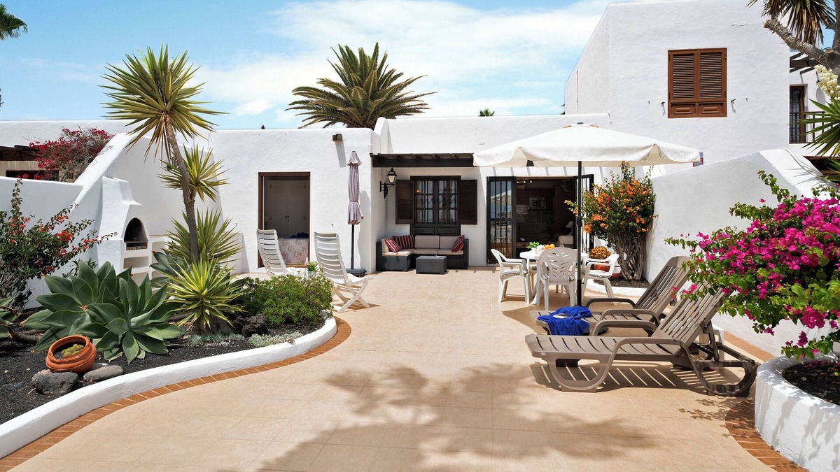 Playa Blanca Apartment | Vacation Home 'Puerto Chico B' with Sea View, Shared Pool & Wi-Fi