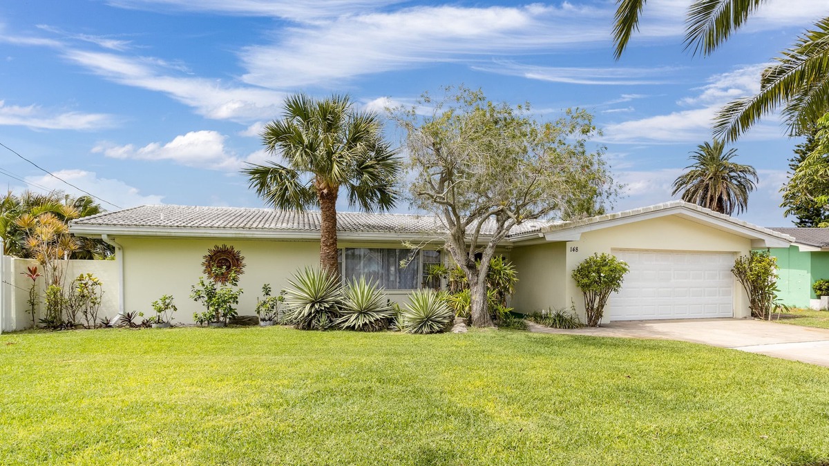 Cocoa Isles House | Vacation Rental Home -Near Beach, On a Canal with Pool - Great Location