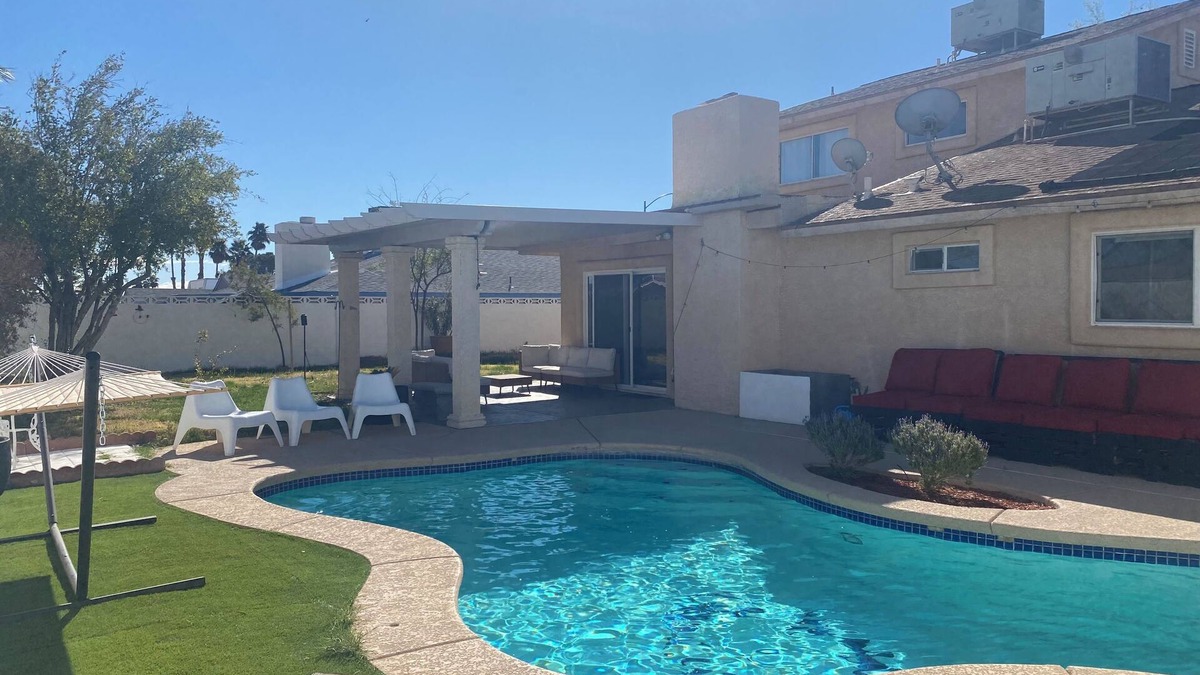 Paradise House | Vegas Oasis 4BR Pool + Patio Near Strip & Airport