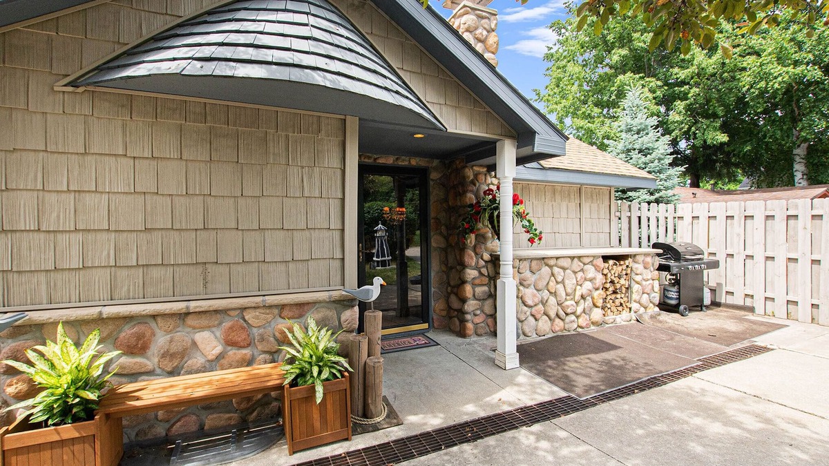 Ludington Cottage | Views abound from this lakefront charmer with in-ground pool