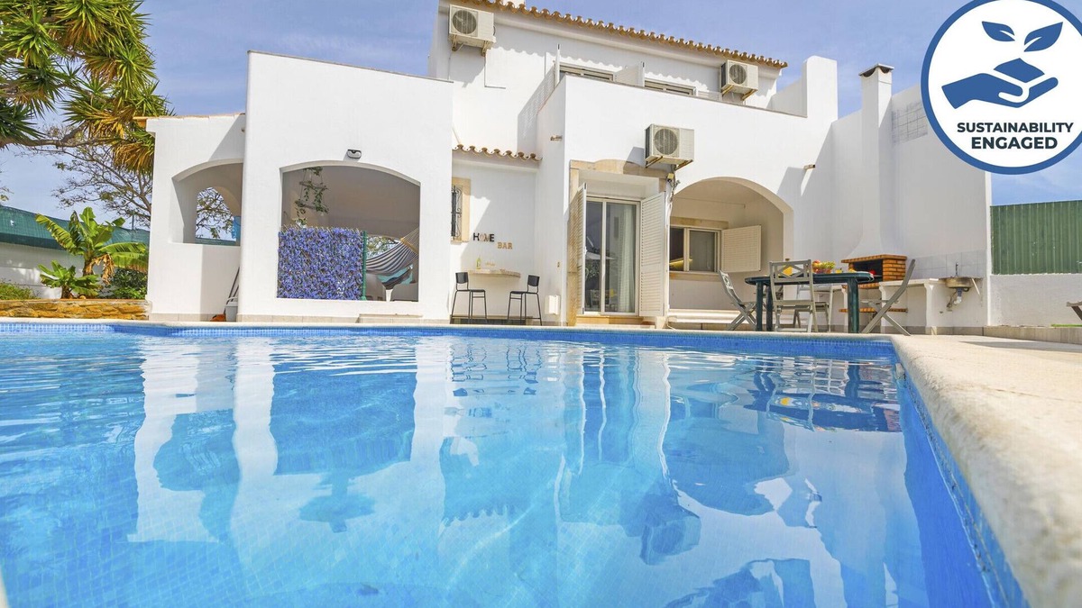 Quarteira Villa | Vilamoura: Retreat with Heatable Pool & BBQ