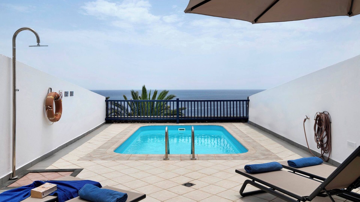 Puerto Calero Villa | Villa 'Ajaches 23' with Sea View, Heated Pool, Balcony, A/C & Wi-Fi