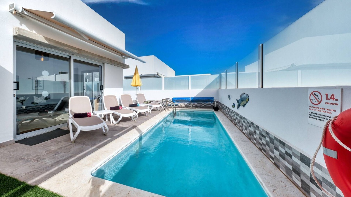 Playa Blanca Ski Chalet | Villa Cassia - Private Pool, Foosball, BBQ, Air-Con and SAT Tv By Lanzarote Vacation Homes