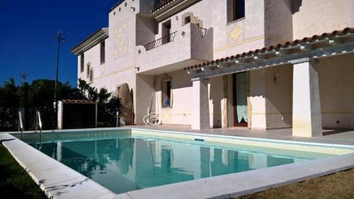 Case Peschiera-Lu Fraili Apartment | Villa Florida 1 with private pool