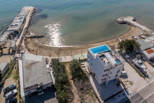 Duce Villa | Villa Lara Beach Front Rooftop Pool & Stunning Views