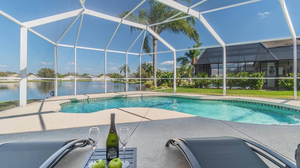 Sabal Harbour House | Villa Madeira -Stylish Pool Abode with Lake Views by Gulfcoast Holiday Homes