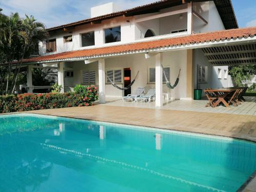 Pecém House | Villa Oloh com lazer completo em Caucaia - CE