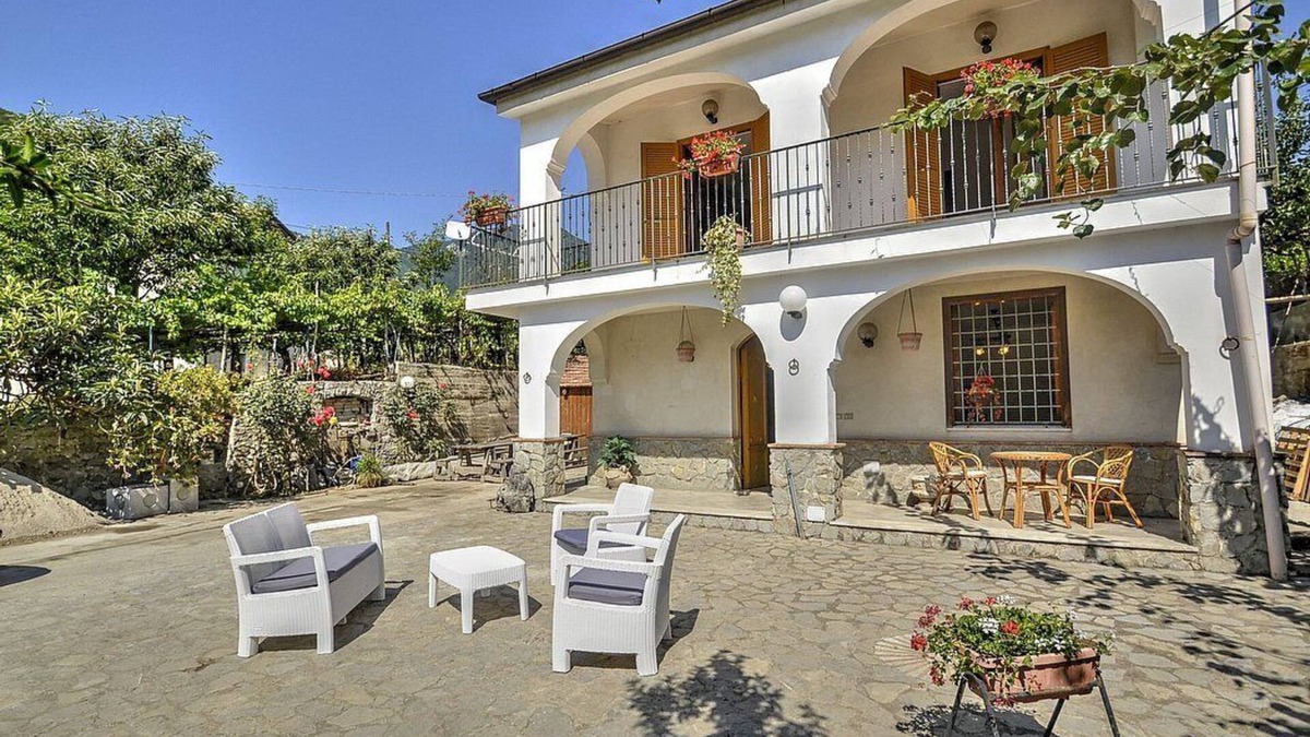 Tramonti Villa | Villa Vinile: A welcoming two-story villa surrounded by the greenery, with Free WI-FI.
