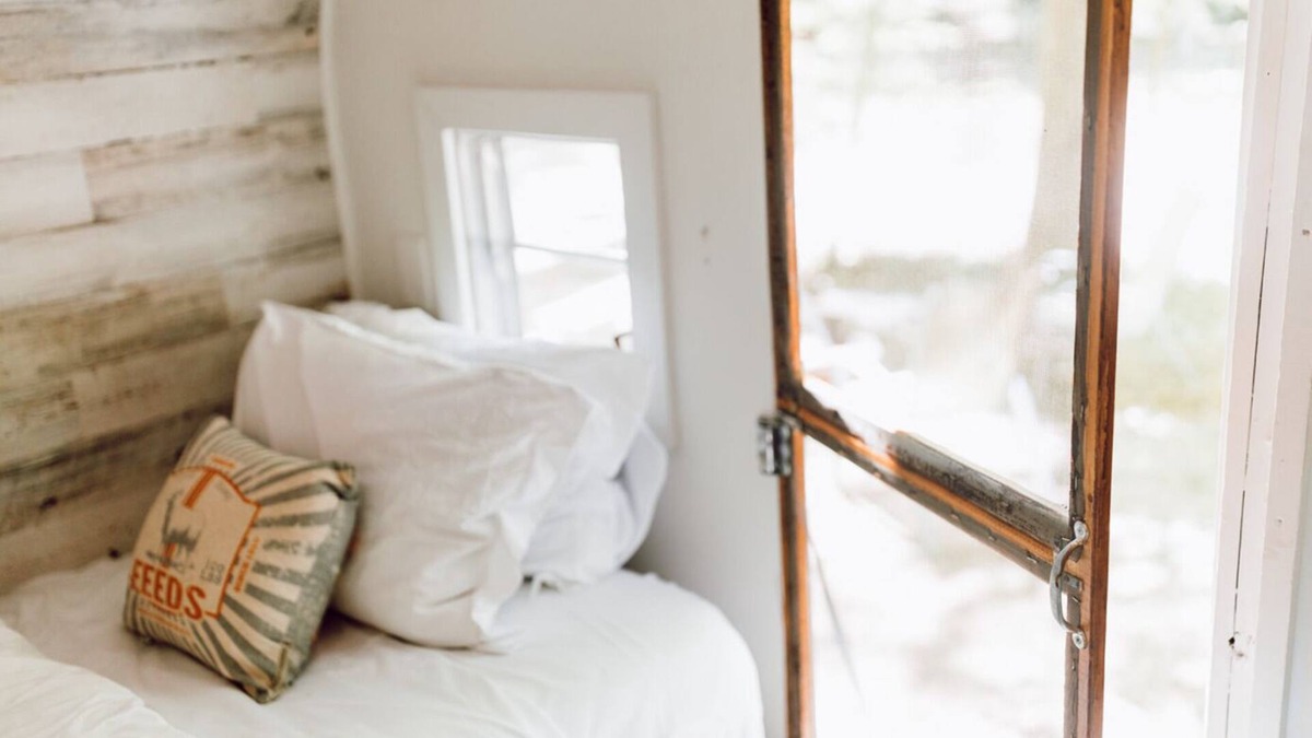 Gnaw Bone RV Rental | Vintage wood camper in Brown County