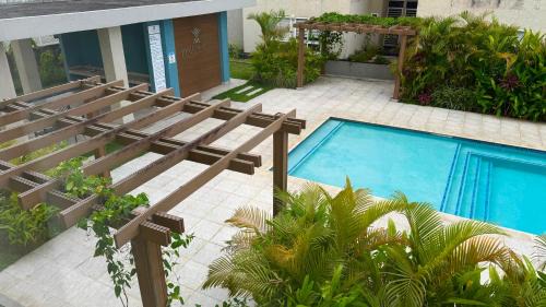Arouca Apartment | Vive Luxe Condo w Pool & 247 Security near Airport