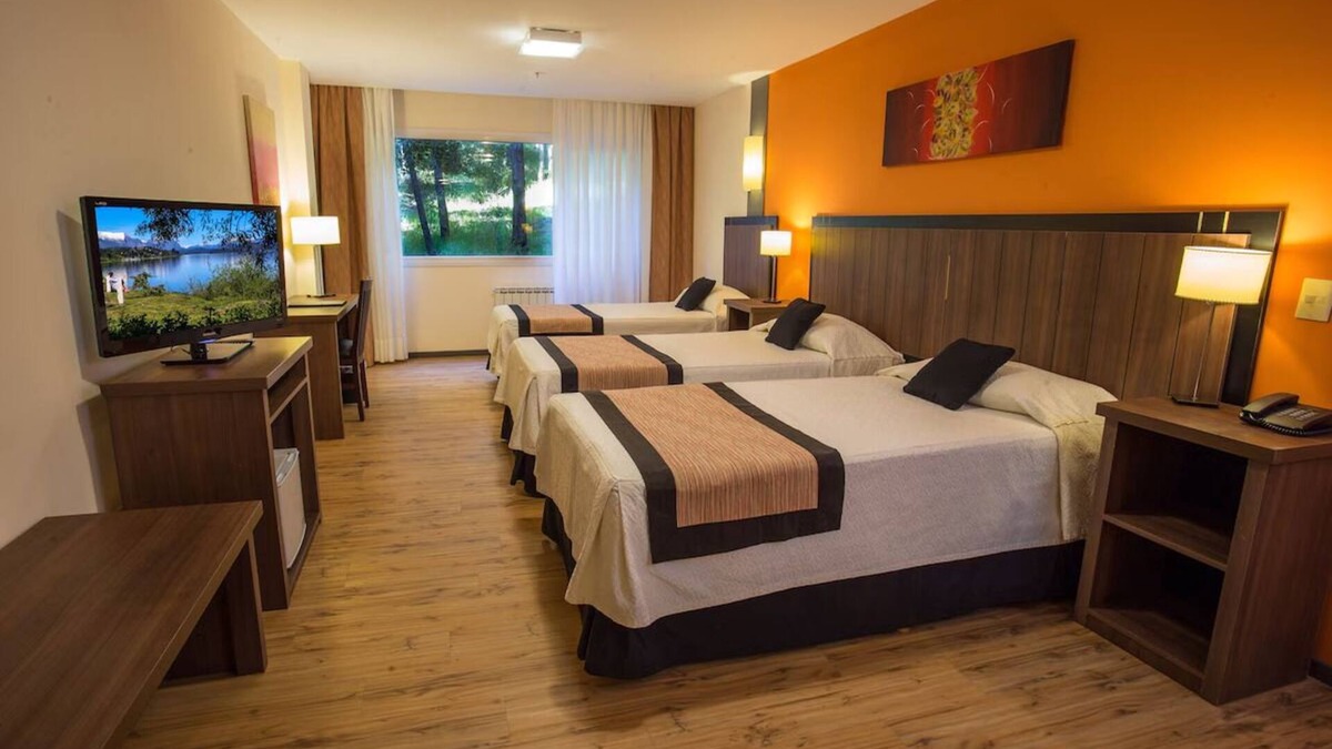 San Carlos de Bariloche Hotel | Wake to Breathtaking Garden Views Near City Center, Steps from Nahuel Huapi Lake