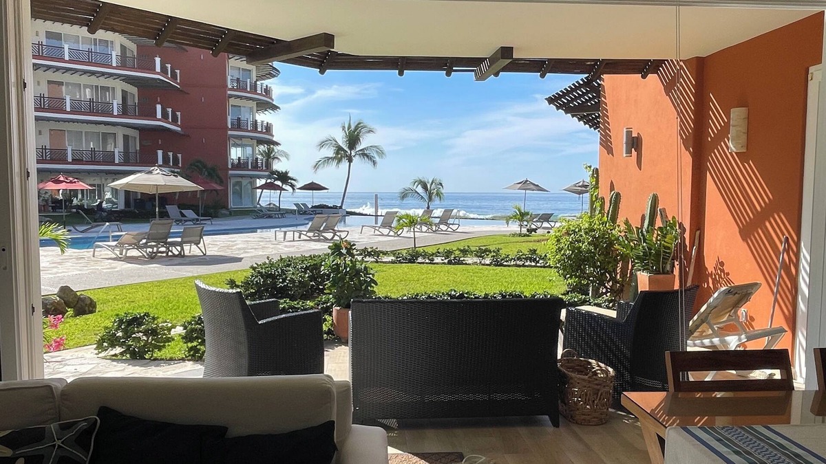 Bajos de Chila Condo | Walk out to pool and ocean steps away.