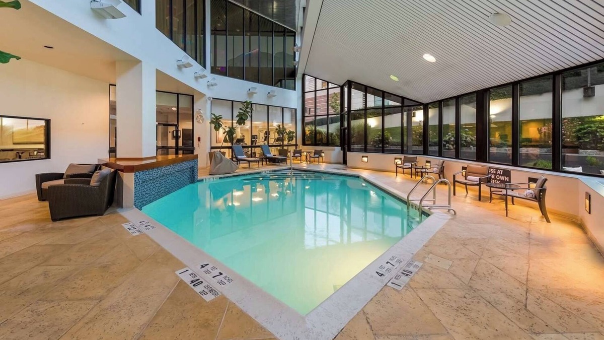 White Plains Hotel | Warm and Comfortable Pets Allowed Two Queen Room w/Pool and Airport Shuttle