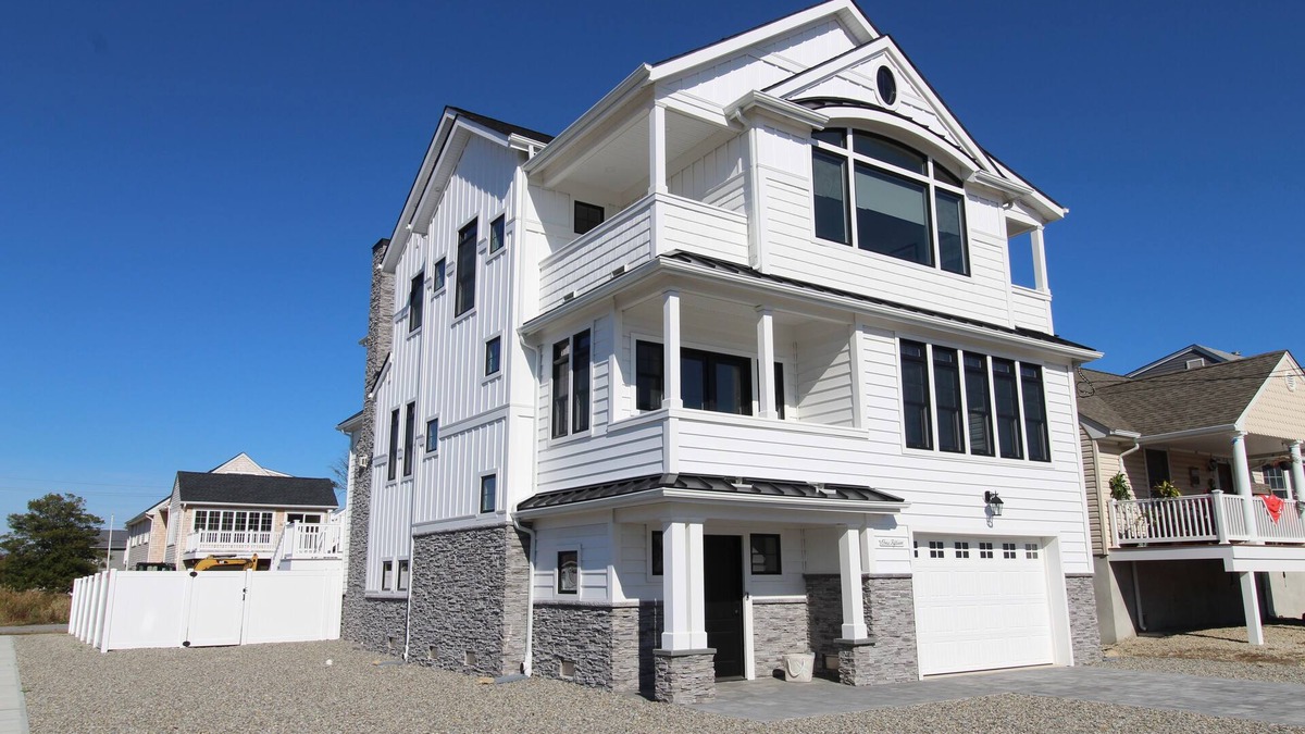 Point Pleasant Beach House | WASH115 | Breathtaking custom coastal 5BR 4ba home! Saltwater pool, cabana rm, views & more!