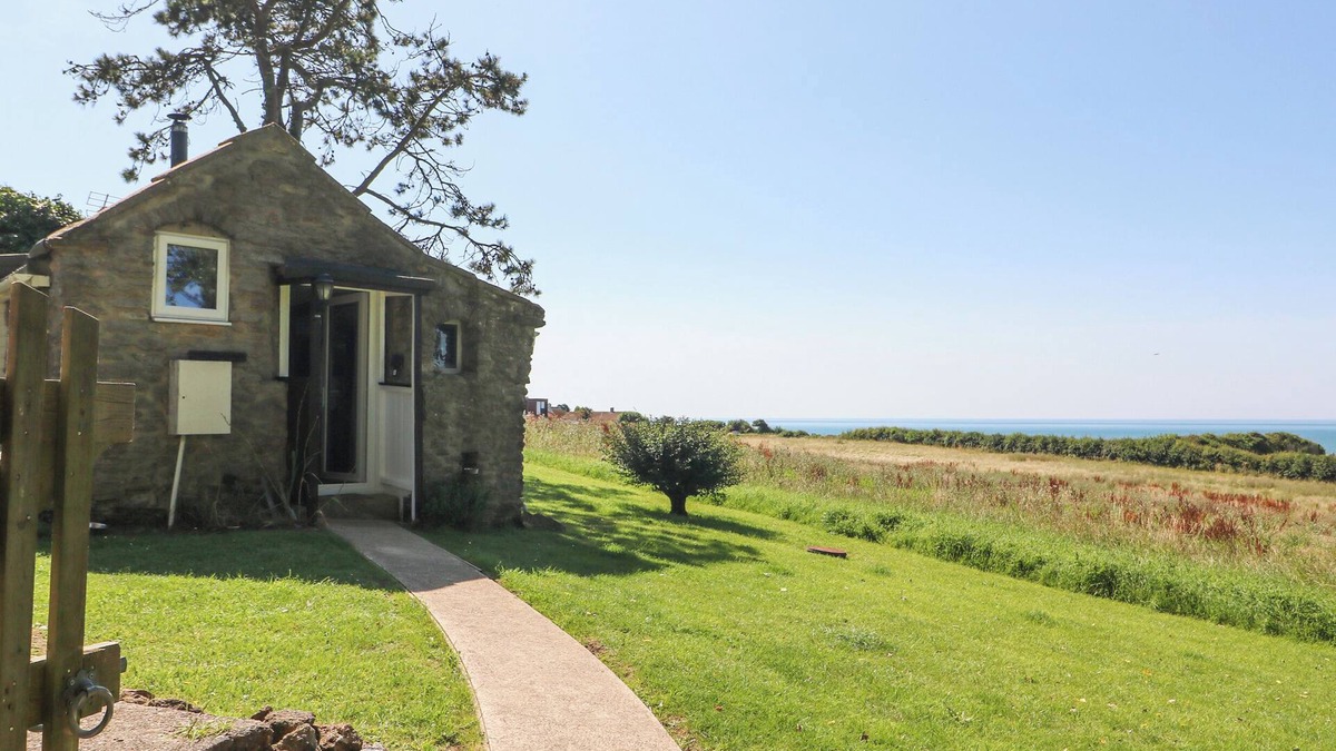 West Bexington Cottage | WASHINGPOOLS, pet friendly, with open fire in West Bexington