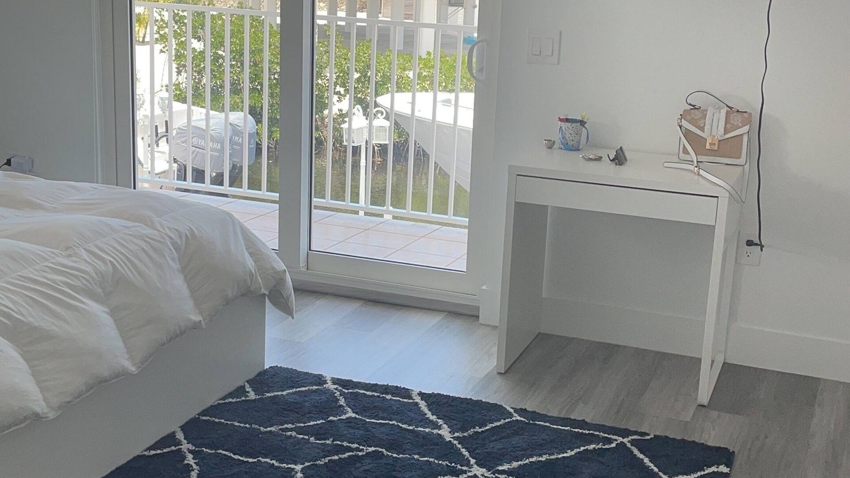 Long Key House | Water front property with bar, tennis, market place, and restaurants close by.