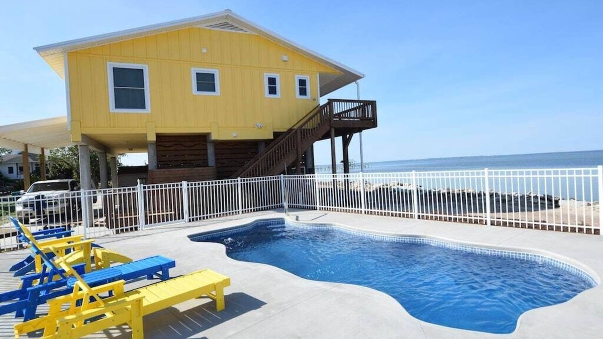 St. George Island House | Water front and side! Pool, Hot Tub, Dock, Game room, Fenced Yard, Dog friendly