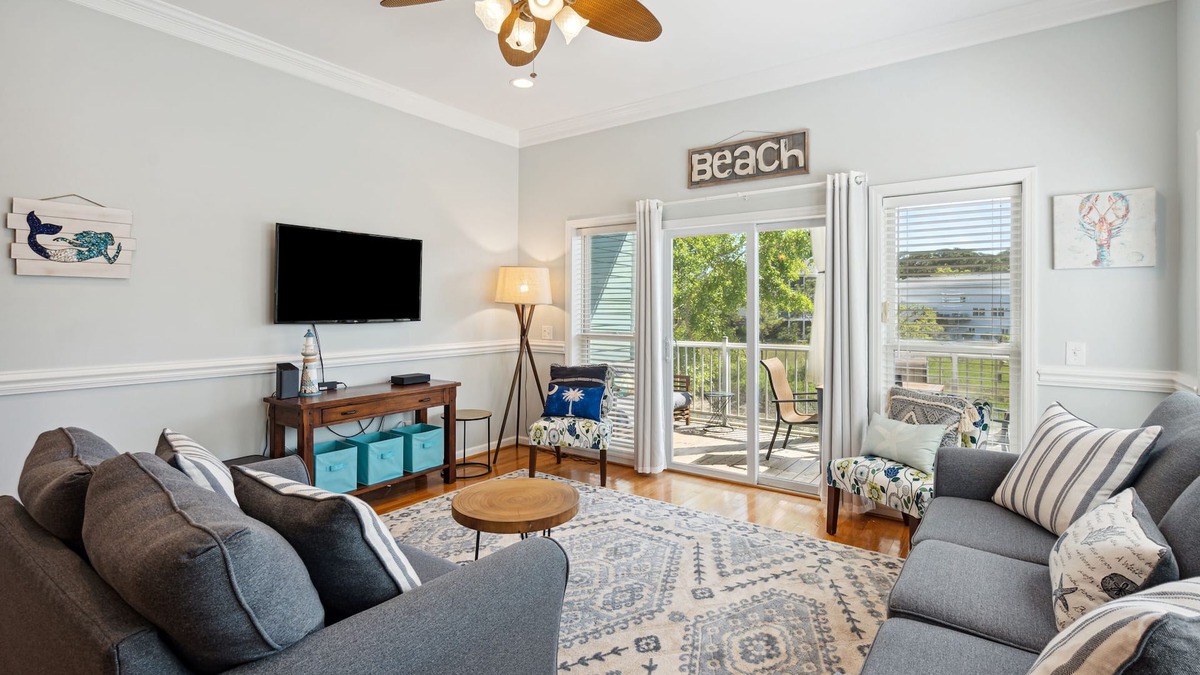 Waters Edge House | Water's Edge 103 - Bright 3BR/3BA Townhome - Pool - Fishing Dock